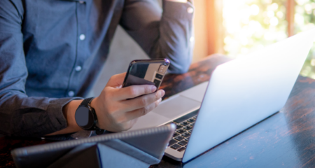 mobile text laptop business man featured img